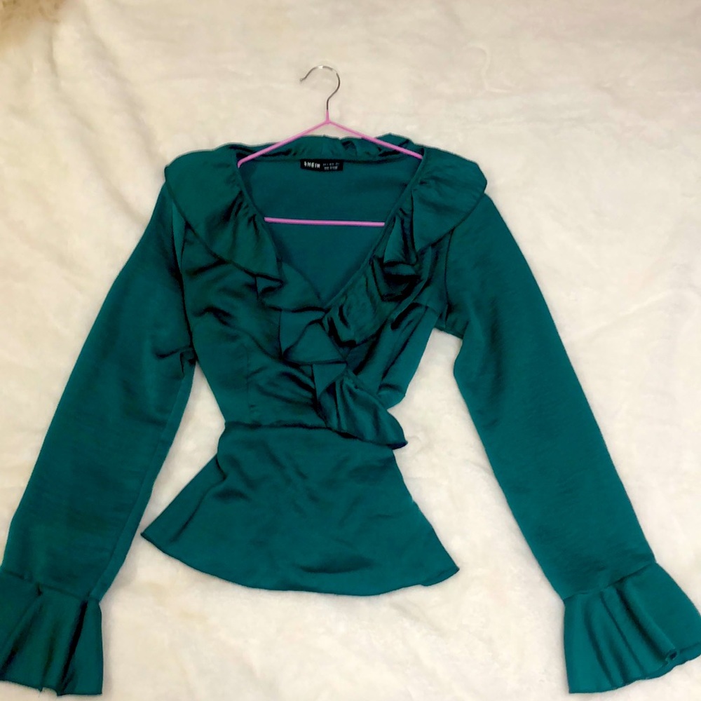 Flirty and feminine wrapped blouse in emerald green. Only worn once from Shein.